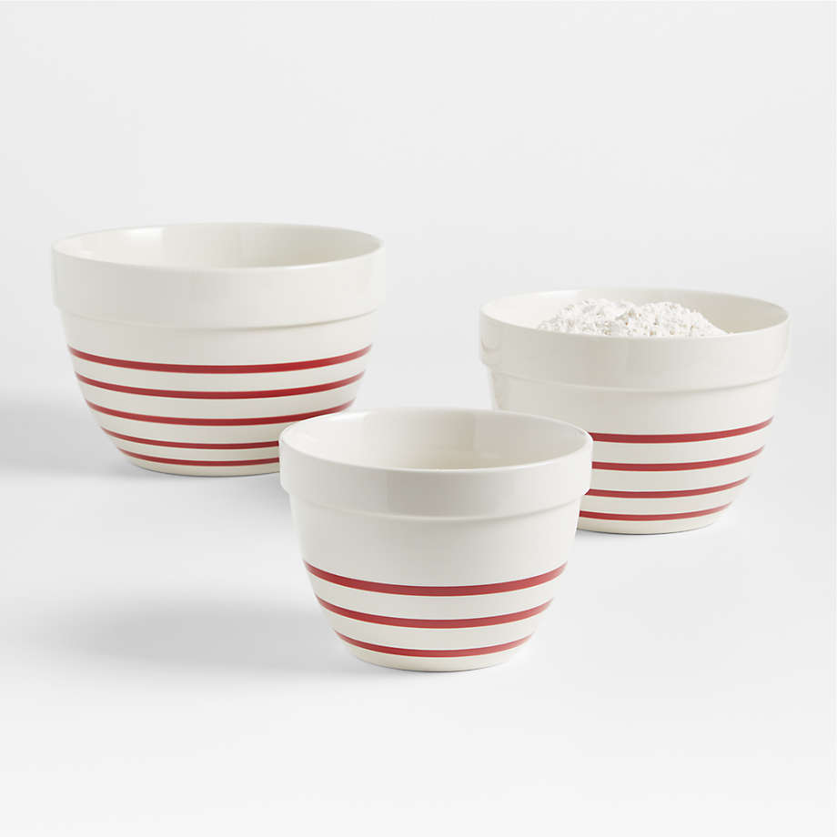 https://cb.scene7.com/is/image/Crate/RedStripeMixingBowlS3SSF23/$web_pdp_main_carousel_med$/230613155827/red-stripe-ceramic-mixing-bowls-set-of-3.jpg