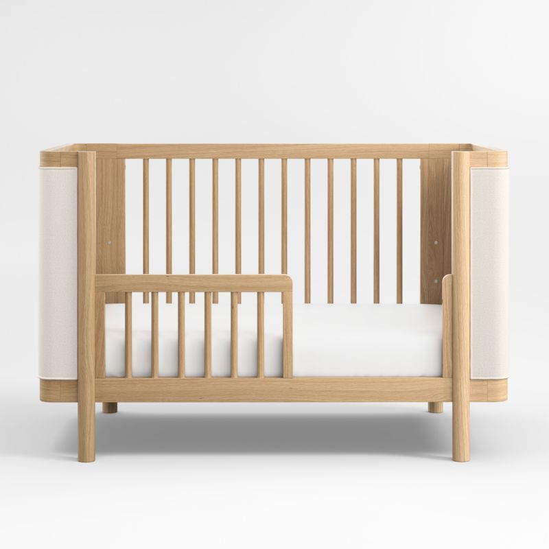 Redondo Upholstered Wood Baby Crib with Toddler Bed Rail