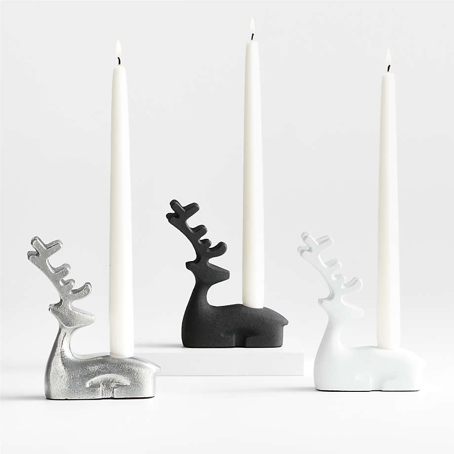 https://cb.scene7.com/is/image/Crate/ReindeerTaperHoldersFSSF22/$web_pdp_main_carousel_med$/220808115048/reindeer-taper-candle-holders.jpg