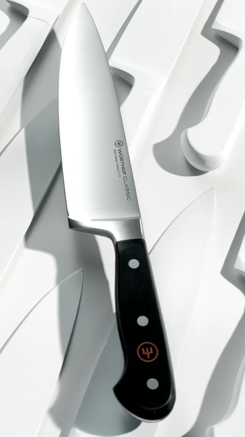Play Wusthof ® Classic Black 5" Hollow Edge Santoku Knife - video 1 of 2