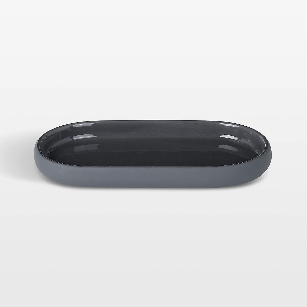 https://cb.scene7.com/is/image/Crate/SONOOvalTrayChrSSF23_VND/$web_pdp_main_carousel_zoom_med$/231031183341/blomus-sono-ceramic-magnet-grey-oval-bathroom-tray.jpg