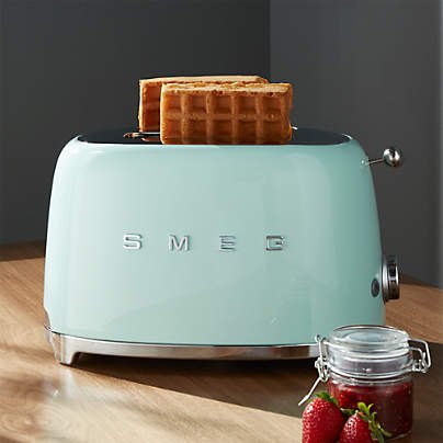 https://cb.scene7.com/is/image/Crate/Smeg2SliceToasterMintSHF16/$web_pdp_carousel_med$/220913133603/smeg-pastel-green-2-slice-retro-toaster.jpg