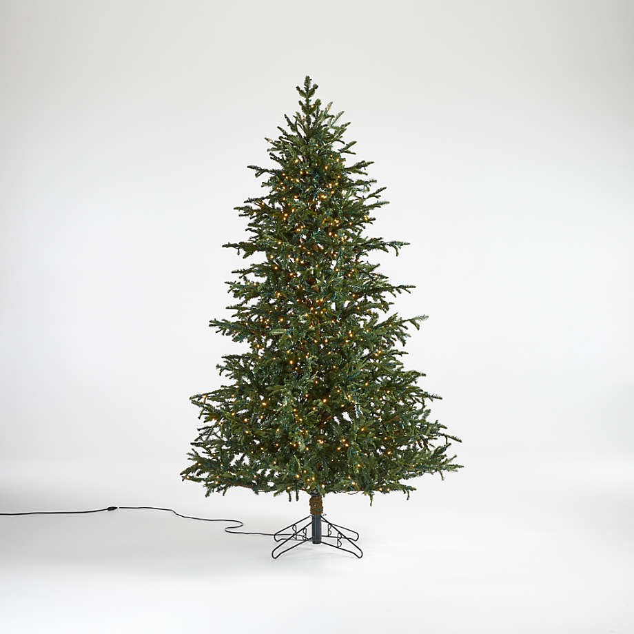 https://cb.scene7.com/is/image/Crate/StarFirTreeWhiteLED7p5MedROF20/$web_pdp_main_carousel_med$/200924150411/faux-noble-fir-pre-lit-led-christmas-tree-with-white-lights-7.5.jpg