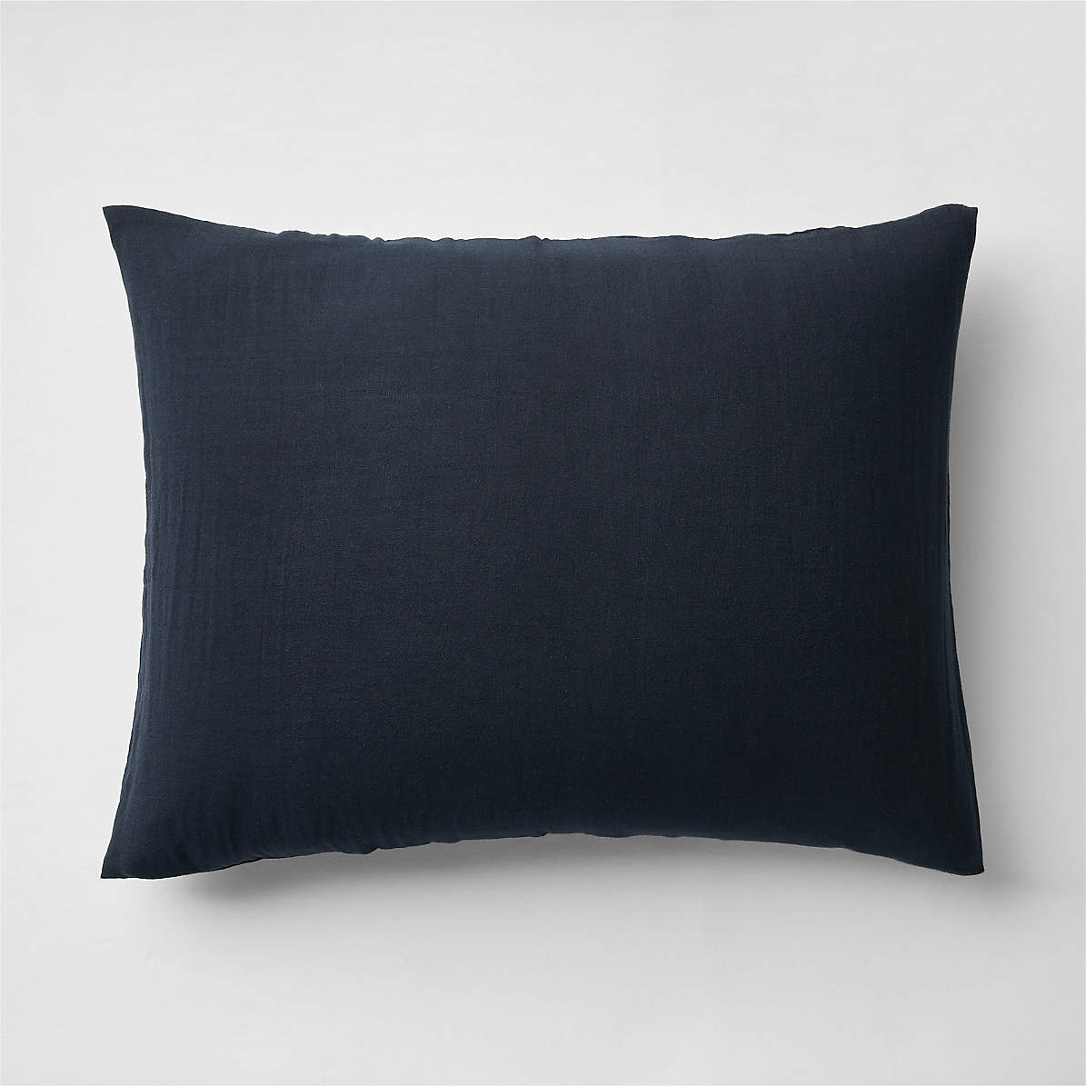 https://cb.scene7.com/is/image/Crate/SupersoftNvyGauzeShamSHS24/$web_pdp_main_carousel_zoom_med$/231213103305/supersoft-midnight-navy-blue-organic-cotton-gauze-kids-pillow-sham.jpg