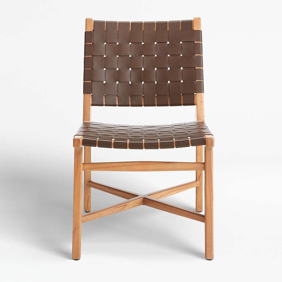 A crate and barrel exclusive Taj Brown Woven Leather Dining Chair