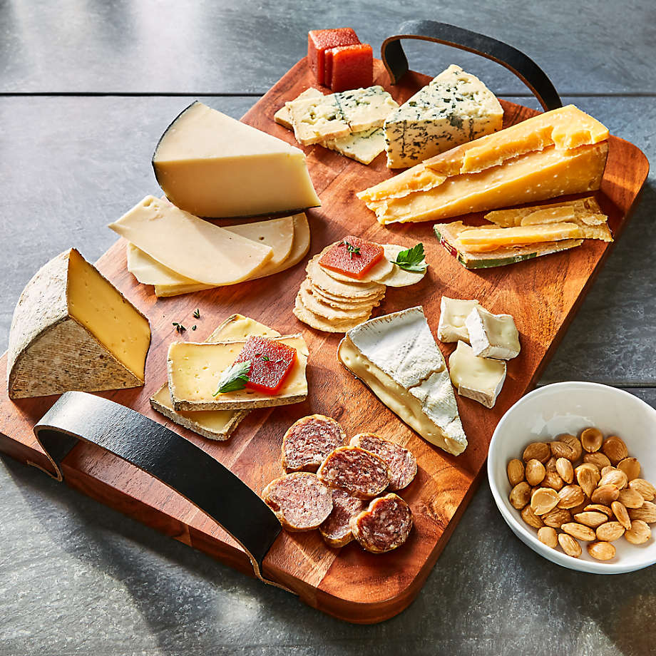 wedding registry ideas Brantley Serving Board with Leather Handles from crate and barrel