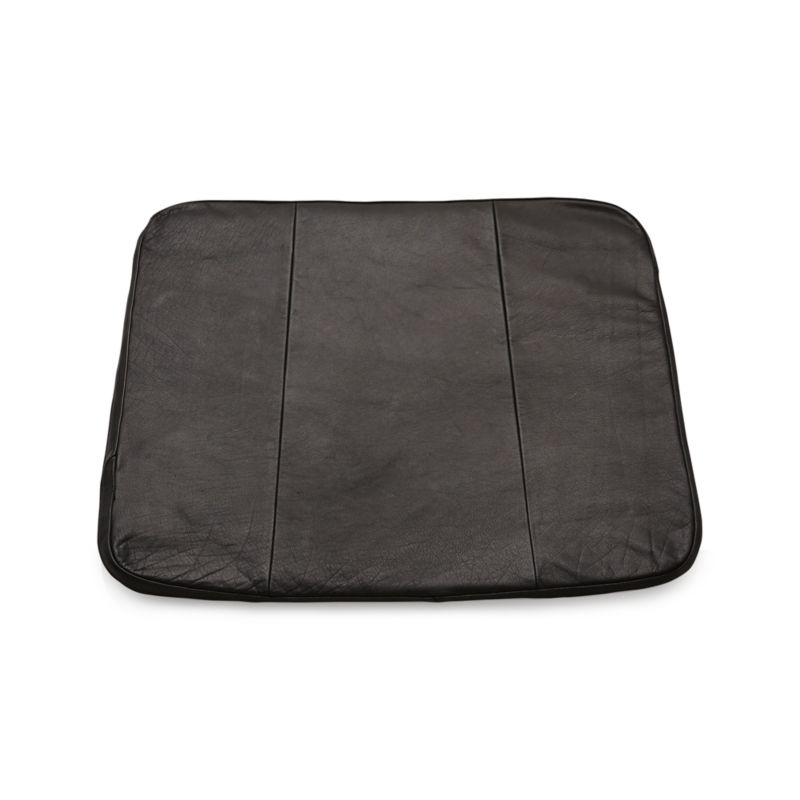 https://cb.scene7.com/is/image/Crate/TigChairCushionBlackLeatherS18