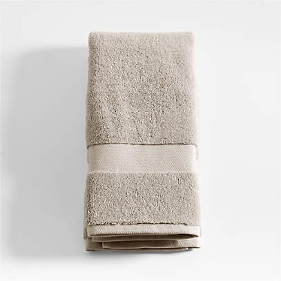 https://cb.scene7.com/is/image/Crate/TurkishOrgTaupeHandTowelSSS23/$web_pdp_main_carousel_low$/230314104301/organic-cotton-taupe-turkish-hand-towel.jpg