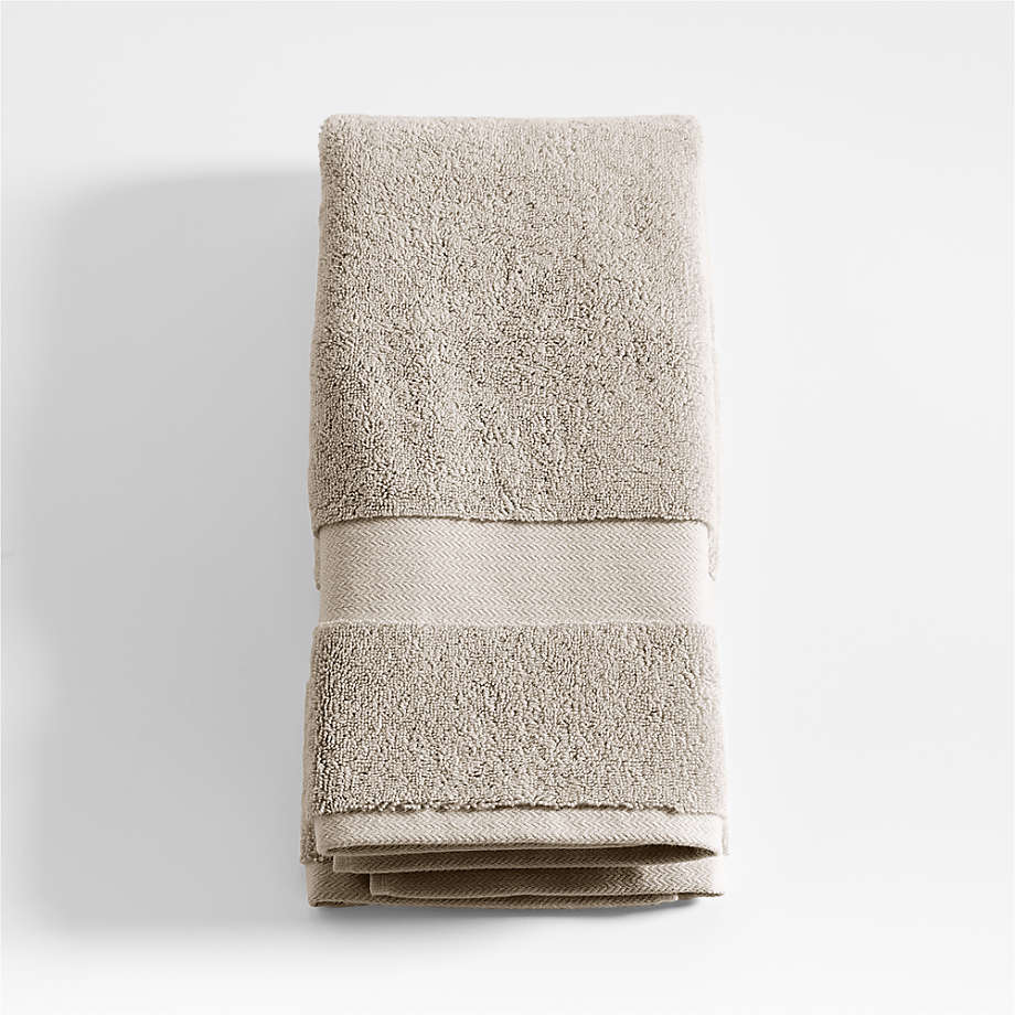 https://cb.scene7.com/is/image/Crate/TurkishOrgTaupeHandTowelSSS23/$web_pdp_main_carousel_med$/230314104301/organic-cotton-taupe-turkish-hand-towel.jpg