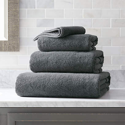 https://cb.scene7.com/is/image/Crate/TurkishSlateTowelGrpFHS18/$web_pdp_main_carousel_low$/240201164719/turkish-cotton-800-gram-slate-grey-bath-towels.jpg