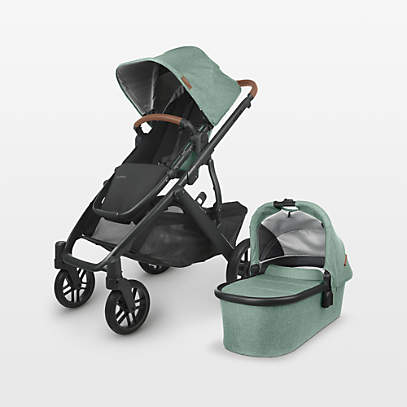 https://cb.scene7.com/is/image/Crate/UPPABbVstV2StrlrGwnSSS23_VND/$web_pdp_main_carousel_low$/230523153751/uppababy-vista-v2-gwen-green-foldable-convertible-baby-stroller.jpg