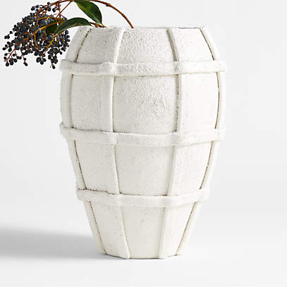https://cb.scene7.com/is/image/Crate/VillaVaseGridSSF23/$web_pdp_main_carousel_low$/230411170527/villa-white-grid-ceramic-vase-15.jpg