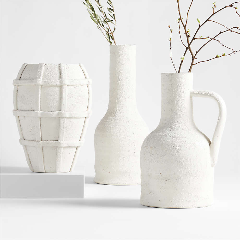 https://cb.scene7.com/is/image/Crate/VillaVasesFSSF23/$web_pdp_main_carousel_med$/230411170527/villa-white-ceramic-vases.jpg