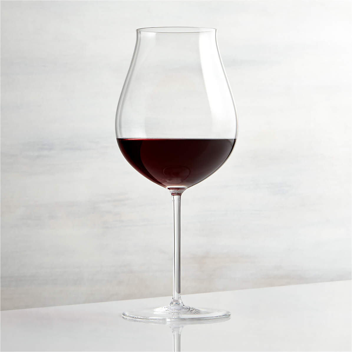 https://cb.scene7.com/is/image/Crate/VineyardPinotNoir26ozSHF15/$web_pdp_main_carousel_zoom_med$/220913132559/vineyard-pinot-noir-wine-glass.jpg