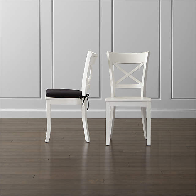 white wooden chairs