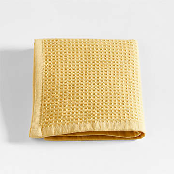 https://cb.scene7.com/is/image/Crate/WaffleOrgWashclothYllwSSF22/$web_recently_viewed_item_sm$/220927170259/yellow-organic-waffle-washcloth.jpg