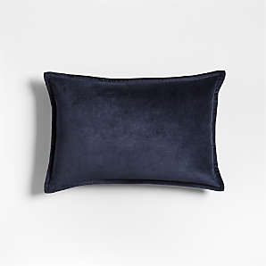 https://cb.scene7.com/is/image/Crate/WashedCtnVlvt12x18PlwIndgSSS24/$web_plp_card_mobile$/231213180123/organic-washed-cotton-velvet-12x18-indigo-blue-throw-pillow.jpg