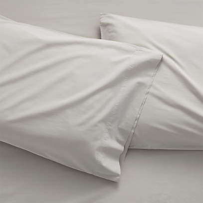 https://cb.scene7.com/is/image/Crate/WashedOrgncCttnGryStdCsPrSHS19/$web_pdp_main_carousel_low$/190411135547/washed-organic-cotton-grey-standard-pillowcases-set-of-2.jpg