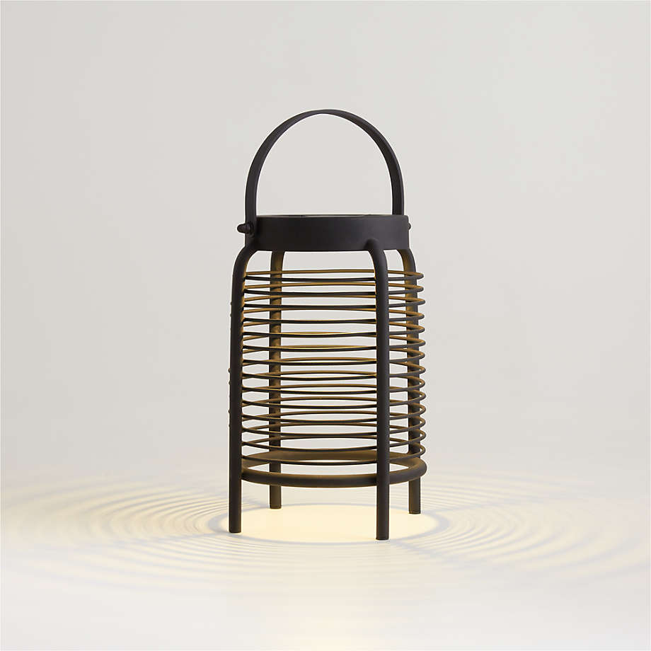 https://cb.scene7.com/is/image/Crate/WellsMtlSolarLntrnSmlAVSSS24/$web_pdp_main_carousel_med$/230907160919/wells-small-black-metal-outdoor-solar-lantern-9.5.jpg