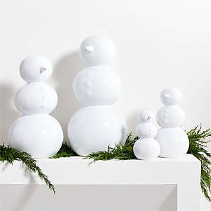 https://cb.scene7.com/is/image/Crate/WhiteCrmcSnowmenAVFSSF23/$web_plp_card_mobile$/230802113133/white-holiday-ceramic-snowmen.jpg