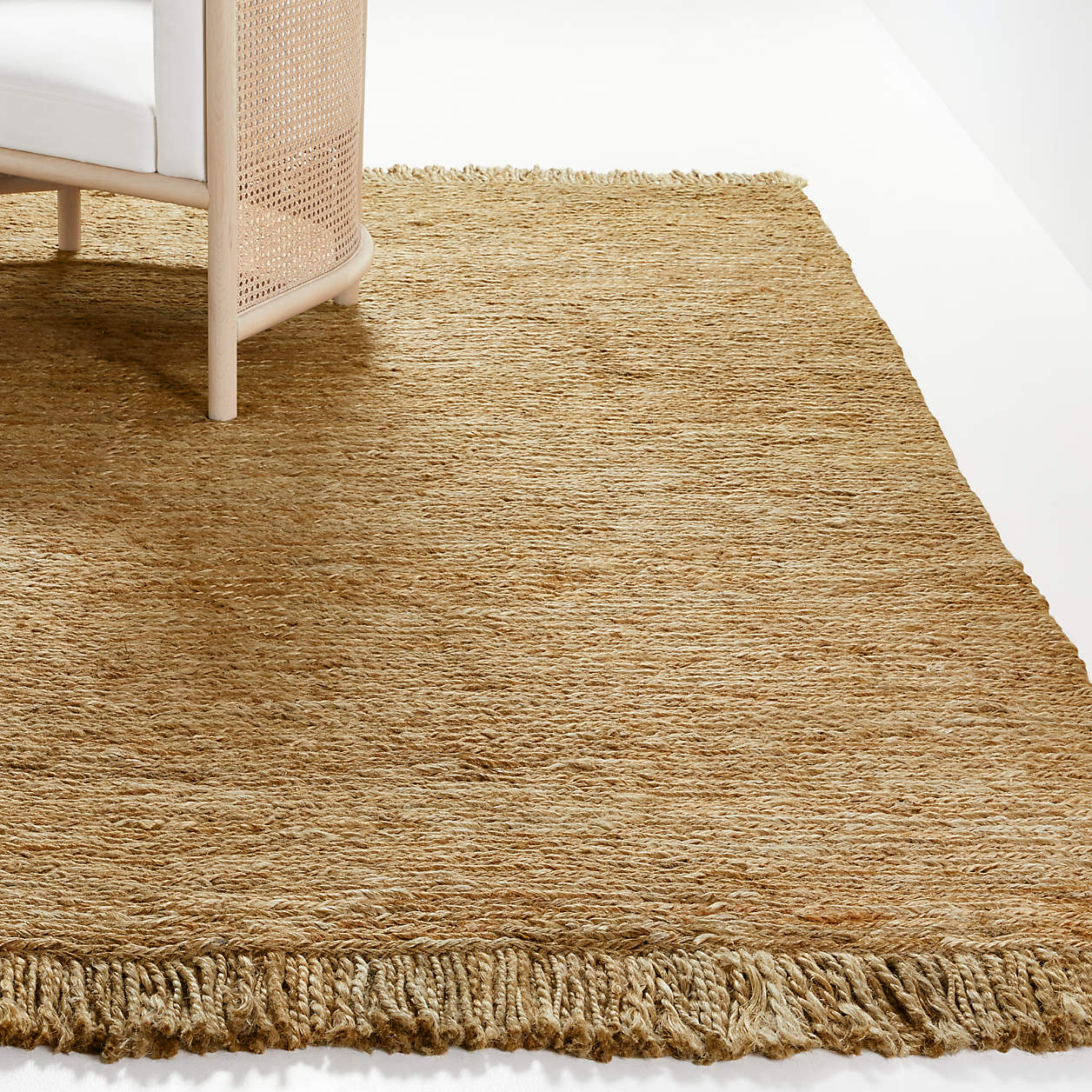 Yuma 5x8 Fringed Natural Jute Rug by Leanne Ford + Reviews Crate & Barrel