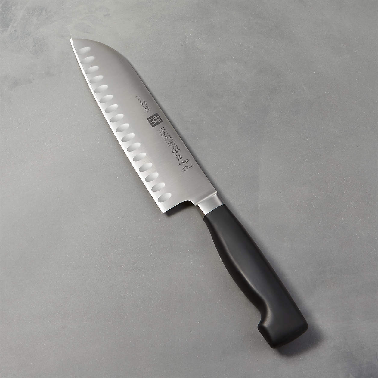 ZWILLING J.A. Henckels Four Star 7" Hollow Edge Santoku Knife + Reviews
