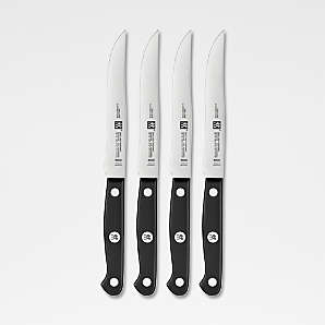 7 - CALPHALON STEAK KNIVES 4-5/8 HALF-SERRATED STAINLESS BLADE FULL TANG  HANDLE