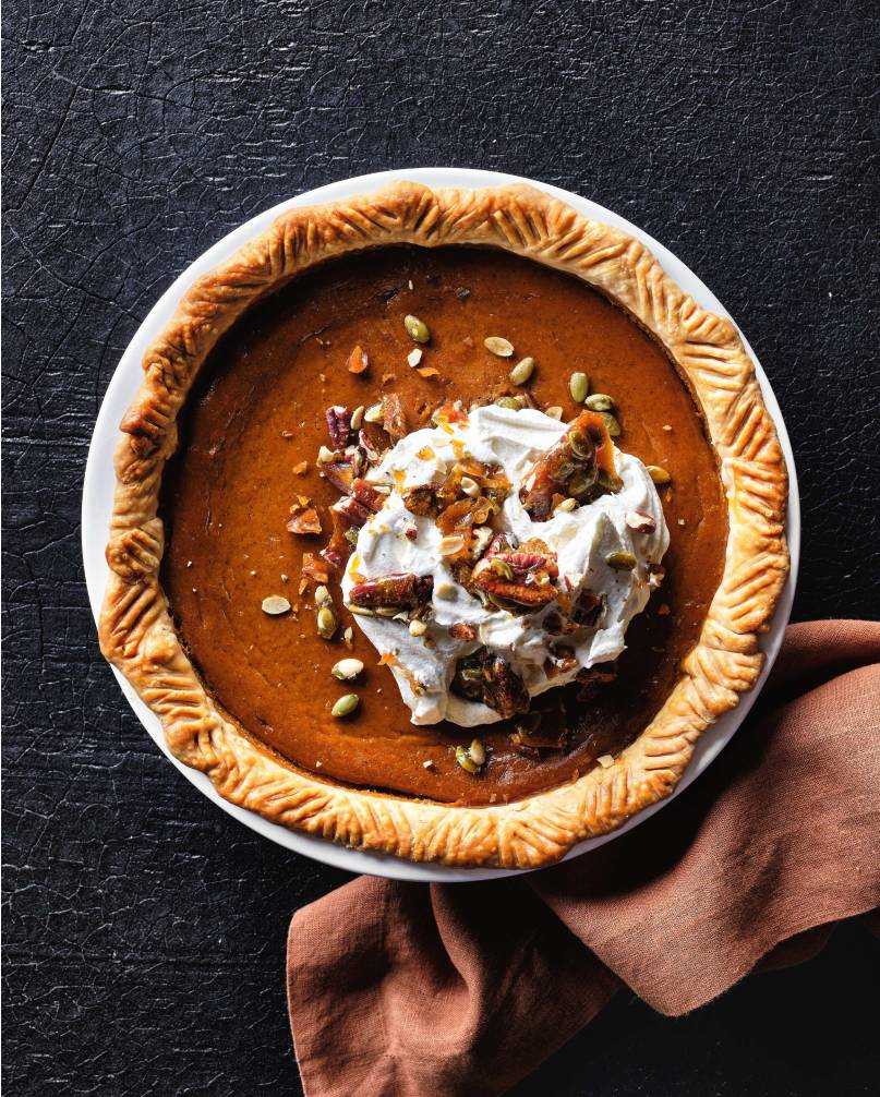pumpkin pie with candied pecans and pepitas