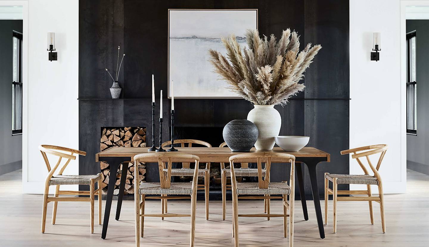 Ophelia vase with faux botanical plume stems on the Lakin dining table with Crescent Wishbone dining chair