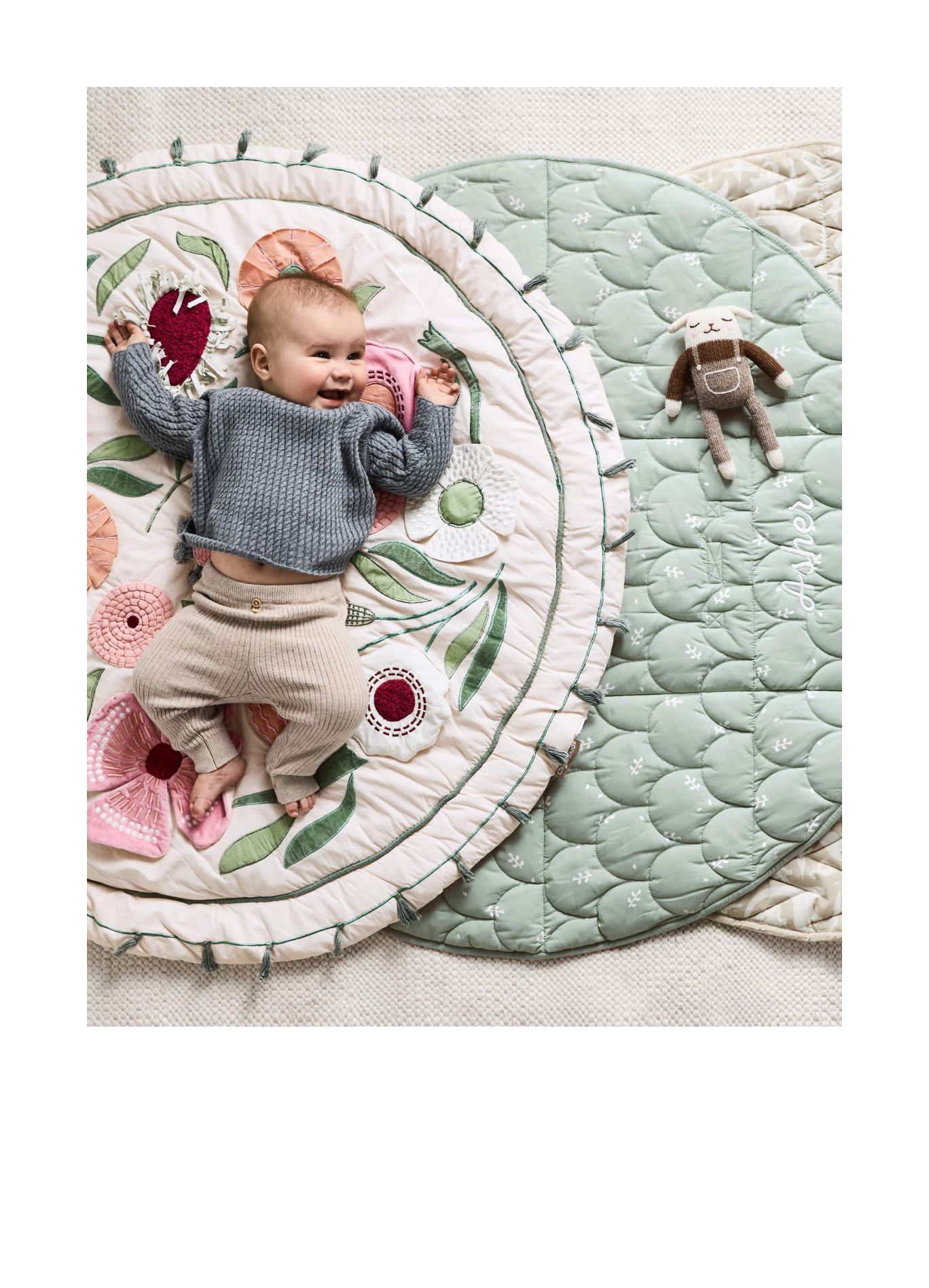 baby on play mat